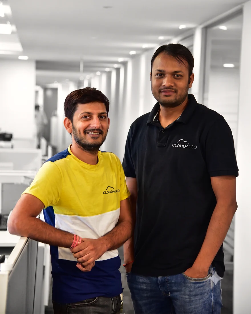 The two CloudAlgo co-founders, standing together in the office in Jaipur.